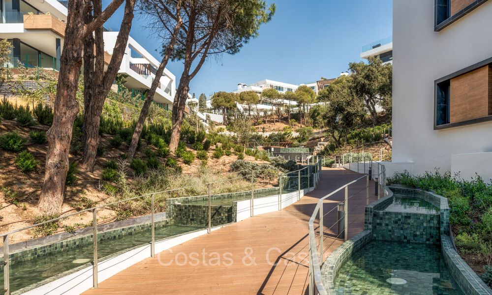 Move-in ready, modern, elegant garden apartment with private garden and sea views for sale in Marbella East 72742