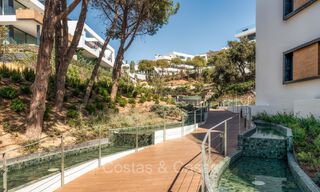 Move-in ready, modern, elegant garden apartment with private garden and sea views for sale in Marbella East 72742 