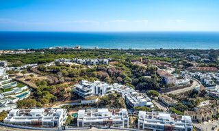 Move-in ready, modern, elegant garden apartment with private garden and sea views for sale in Marbella East 72743 