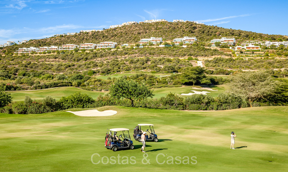 First class modern luxury apartment with breathtaking sea and golf views for sale in a 5* golf resort in Casares, Costa del Sol 73373