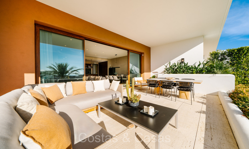 First class modern luxury apartment with breathtaking sea and golf views for sale in a 5* golf resort in Casares, Costa del Sol 73391