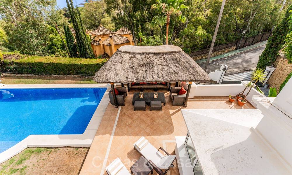 Traditional Spanish luxury villa for sale with sea views in an exclusive gated community in La Quinta, Benahavis - Marbella 73427