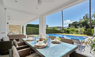 Spacious Mediterranean style family villa for sale, frontline golf on the New Golden Mile, Marbella - Benahavis 73629 