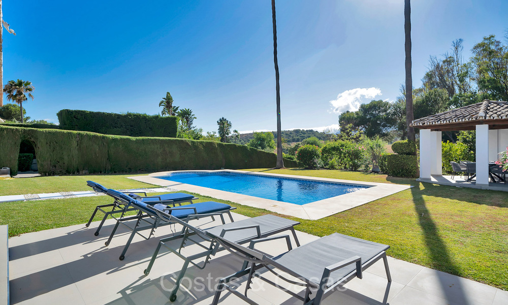 Spacious Mediterranean style family villa for sale, frontline golf on the New Golden Mile, Marbella - Benahavis 73632