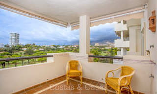 Spacious apartment with spectacular golf and sea views, walking distance to the beach in East Marbella 74104 