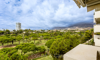 Spacious apartment with spectacular golf and sea views, walking distance to the beach in East Marbella 74105 