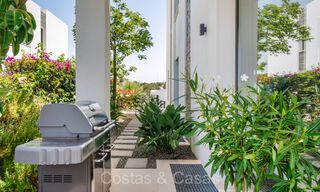 Move-in ready modern semi-detached villa with sea views for sale, on the golf course in East Marbella 74196 