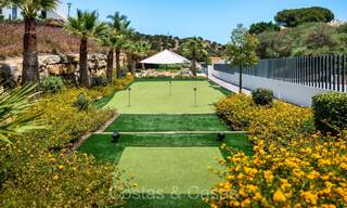 Move-in ready modern semi-detached villa with sea views for sale, on the golf course in East Marbella 74204 