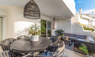 Contemporary renovated apartment within walking distance to all amenities and the beach in Nueva Andalucia, Marbella 74648 