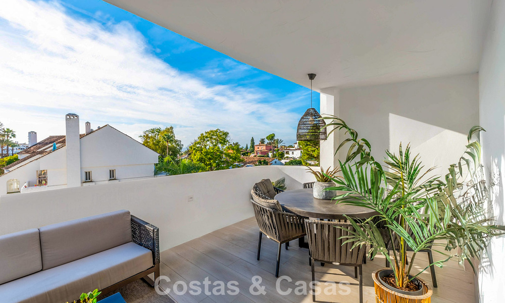 Contemporary renovated apartment within walking distance to all amenities and the beach in Nueva Andalucia, Marbella 74650