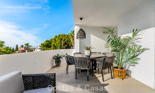 Contemporary renovated apartment within walking distance to all amenities and the beach in Nueva Andalucia, Marbella 74651 