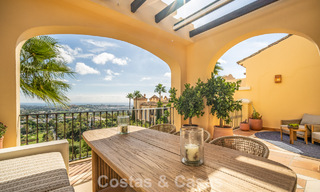 Frontline golf penthouse with magnificent golf and sea views for sale in a gated community in Benahavis - Marbella 74740 