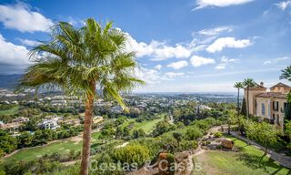 Frontline golf penthouse with magnificent golf and sea views for sale in a gated community in Benahavis - Marbella 74741 