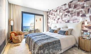 Frontline golf penthouse with magnificent golf and sea views for sale in a gated community in Benahavis - Marbella 74754 