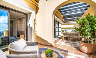 Frontline golf penthouse with magnificent golf and sea views for sale in a gated community in Benahavis - Marbella 74756 