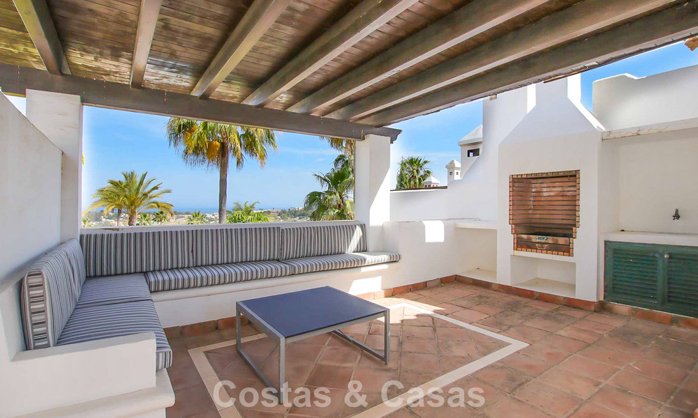 Spacious, move-in ready townhouse for sale with sea view in a gated complex in Benahavis - Marbella 773534