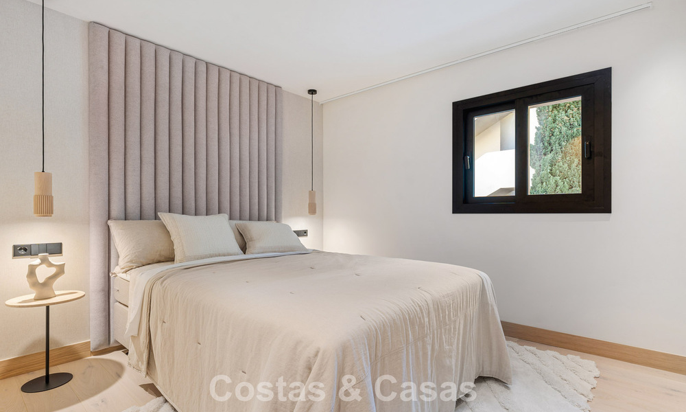 Contemporary renovated luxury apartment for sale with panoramic sea views in Nueva Andalucia’ Golf Valley, Marbella 773773