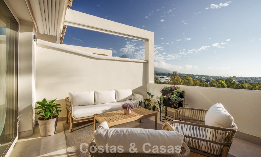 Contemporary renovated luxury apartment for sale with panoramic sea views in Nueva Andalucia’ Golf Valley, Marbella 773790