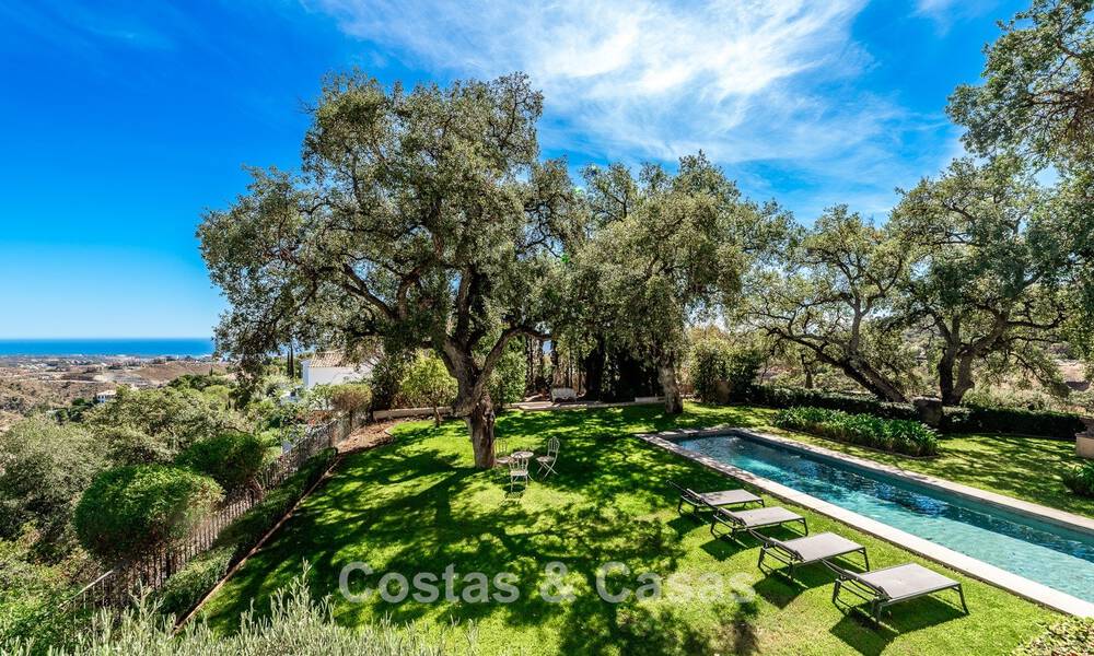 Enchanting luxury villa on beautiful grounds for sale surrounded by greenery in El Madroñal, Benahavis - Marbella 774147