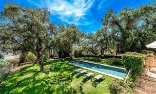 Enchanting luxury villa on beautiful grounds for sale surrounded by greenery in El Madroñal, Benahavis - Marbella 774149 