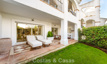 Stylish apartment with private garden for sale in a gated community in Sierra Blanca, Marbella 793909